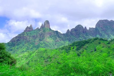 Feel the warmth of santiago island—cook cuscuz with locals, wander assomada market, swim at tarrafal beach. includes pickup from praia and hands-on workshop.