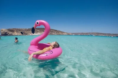 Swim in malta’s blue lagoon, explore gozo by private boat, and snorkel hidden bays. includes pickup from cirkewwa or mgarr port and all permits.