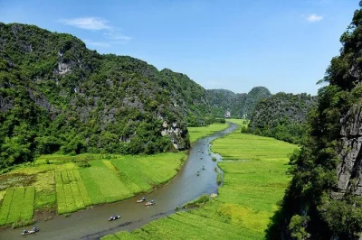 Explore ninh binh in a day: hoa lu ancient capital, am tien cave, tam coc boat ride, cycling to bich dong pagoda. hotel pickup from hanoi old quarter.
