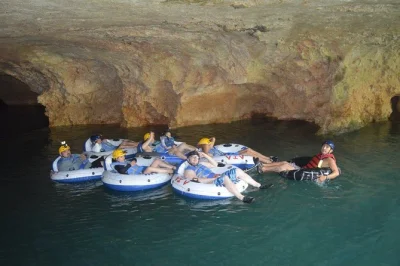 Feel the cool river, float under maya mountains, and laugh with your guide on this belize cave tubing small group trip—includes pickup, gear, and flexible timing.