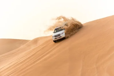 Feel the rush of dune bashing, ride camels at sunset, and share a bbq dinner under dubai’s desert sky. includes hotel pickup, live shows, and local guide.