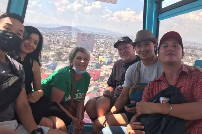 See iztapalapa by cable car, taste street tacos, explore murals, and end with pulque in a local bar—includes metro rides and a local guide from downtown cdmx.
