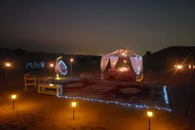 Feel the thrill of dubai’s red dunes with private dune bashing, camel rides, and a bbq dinner under the stars. includes pickup, sandboarding, and local guide.