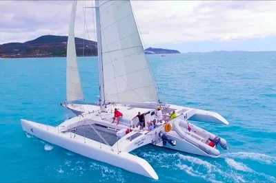Feel the wind on a st. maarten trimaran day sail, with snorkeling, lunch, and drinks included. small group cruise along baie rouge beach and anguilla channel.