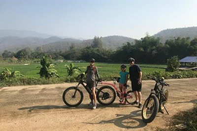 Feel the breeze on a guided e-bike ride through nam phrae’s hills, forest temples, and quiet villages near chiang mai. includes hotel pickup and lunch.