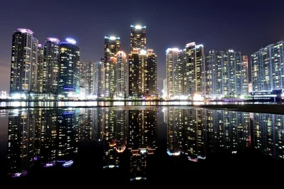 Feel busan light up on a night cruise with fireworks, city skyline views from hwangnyeongsan mountain, and easy hotel pickup. small group tour, all fees included.