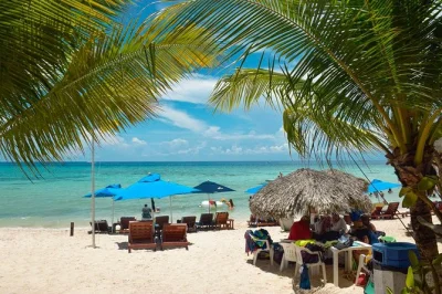 Start your cozumel day trip with a private driver, explore san gervasio mayan ruins, taste chocolate and tequila, and unwind at playa palancar beach with lunch included.