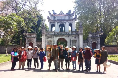 Step into hanoi’s layered history, from the temple of literature to dong xuan market, with a guide. includes hotel pickup, entry fees, and vietnamese lunch.