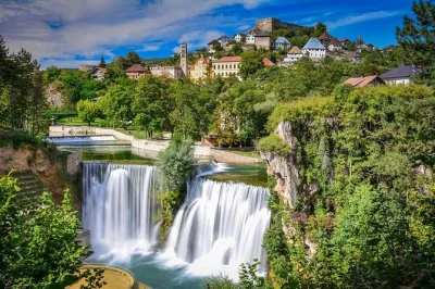 Wander medieval streets in travnik, stand by jajce’s waterfall, and see pliva watermills on this sarajevo day trip. includes private transport and local guide.