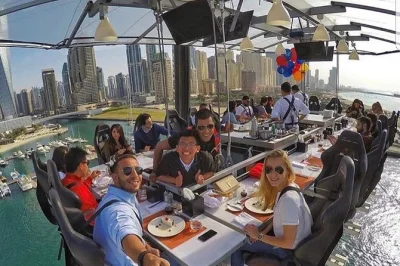 Savor a 3-course meal suspended above dubai marina, with city and water views. includes safety briefing, menu choice, photos, and all drinks—book your aerial dinner now.