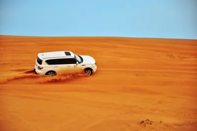 Feel the dubai desert come alive with private dune bashing, camel rides, sunset photos, bbq dinner, and live shows. includes pickup and local guide.