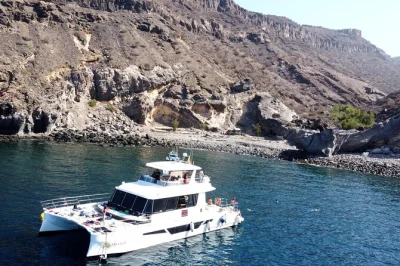 Feel the atlantic breeze on a gran canaria catamaran cruise from puerto rico, with swimming, snorkeling, drinks, and a relaxed lunch—includes pickup.
