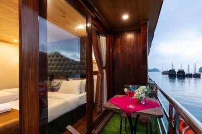 Book a 2-day halong bay cruise with kayaking, sung sot cave, ti top island, seafood meals, night fishing, and round-trip hanoi transfer. small group adventure.