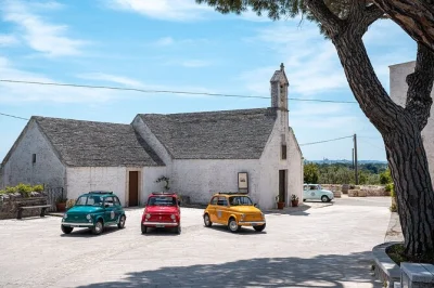 Découvrez le charme du valle d'itria en pouilles au volant d’une fiat 500 vintage, avec arrêts dans les villages trulli, oliveraies et églises historiques. location incluse.