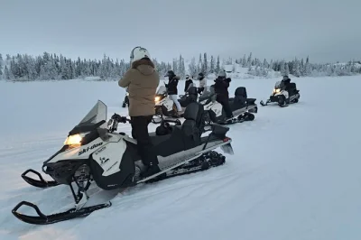 Feel the rush of a guided snowmobile tour in yellowknife, crossing frozen lakes with heated gear, local guides, and optional ice cave visit. includes pickup.