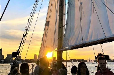 Feel the breeze on a boston harbor sunset cruise aboard a classic tall ship. watch the skyline glow, sip local beer, and unwind with friendly crew—includes onboard drinks for purchase.
