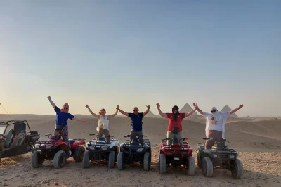 Experience the giza pyramids, ride camels, enjoy lunch with pyramid views, and catch the sunset on an atv. private tour with hotel pickup in cairo.
