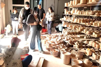 Experience bat trang ceramics village near hanoi: factory tours, ancient kiln, hands-on pottery class, and explore the old village with a local guide.