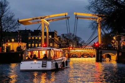 Sip unlimited wine or beer on a cozy amsterdam saloon boat, with dutch snacks and local stories. small group, english-speaking skipper, digital booklet in 8 languages.