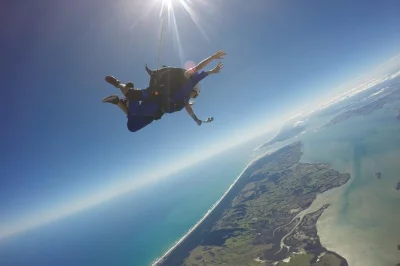 Feel the rush on a tandem skydive near auckland, freefalling from up to 18,000ft with coast-to-coast views. includes all gear, safety briefing, and flexible rescheduling.