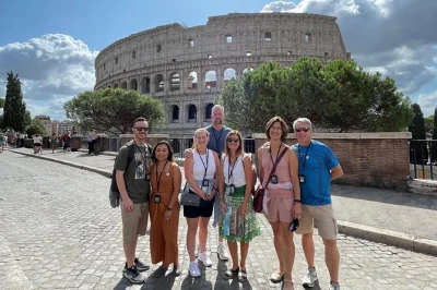 Step onto the colosseum arena floor, explore the underground dungeons, and wander the roman forum with a passionate guide. includes entry tickets and headsets.