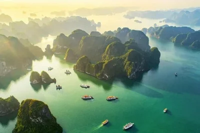Wake up to halong bay’s limestone towers, kayak lan ha waters, join a vietnamese cooking class, and enjoy seafood lunch—includes hanoi pickup and private cabin.