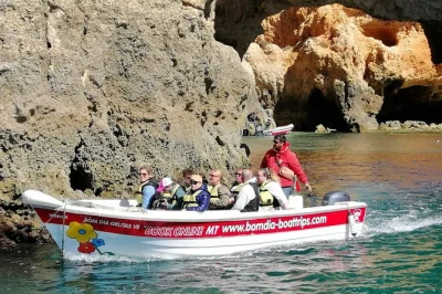 Feel the sea breeze on a small boat tour from lagos to ponta da piedade caves. glide past golden cliffs, hidden grottos, and relax with a friendly local skipper—equipment included.