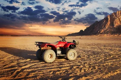 Feel the sinai desert wind on an atv quad bike, visit echo mountain, and sip bedouin tea in sharm el sheikh. includes pickup, guide, and camel ride option.