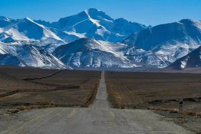 Travel from bishkek to dushanbe on the pamir highway. explore song kul, lenin peak, wakhan valley, and local yurt stays. book your central asia tour.