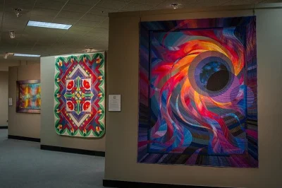 Lose track of time among vivid quilts, tactile textures, and quiet stories at the national quilt museum in paducah—flexible entry ticket, all ages welcome.