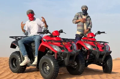Feel the thrill of dubai’s red dunes with quad biking, buggy rides, and a camel trek. includes pickup, sandboarding, and a local guide for a seamless day out.