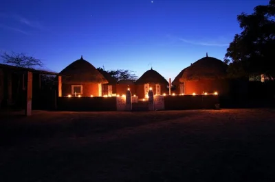 Stay overnight in a jodhpur village mud house, enjoy home-cooked meals, and experience authentic rajasthani family life. includes pickup and all meals.