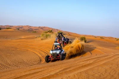 Feel the dubai desert solo in a polaris 1000cc buggy with private hotel pickup, one hour of self-drive, and local guides leading the way. all gear included.