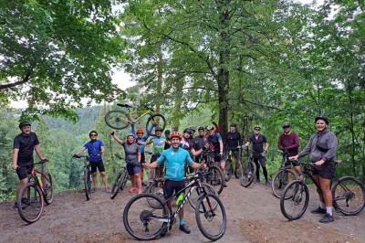 Explore vilnius by mountain bike—ride through pavilniai park, užupis, and scenic viewpoints. guided tour with bikes, helmets, and water included.
