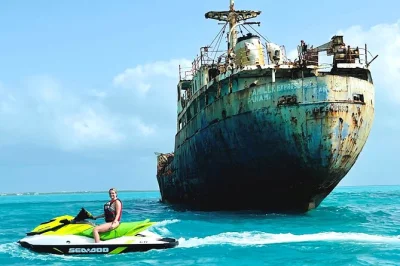 Feel the rush on a providenciales jet ski tour to the la famille express shipwreck, with time for climbing and diving. includes all fees and local guidance.