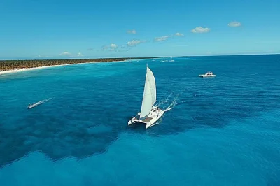 Feel the breeze on a 75-foot catamaran to saona island, snorkel with guides, relax far from crowds, and enjoy lunch with rosé. includes bayahibe pickup.