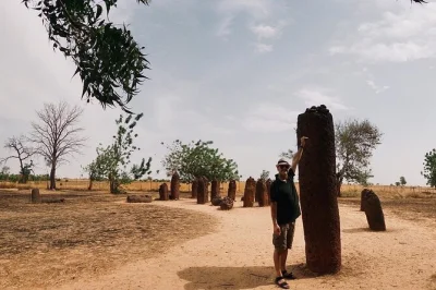 Watch jembe drummers by desert fire, see pink lake salt harvesters, meet bedik villagers and trek to dindefello falls—all with private transport and local guide.