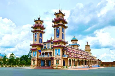 Feel the chants at cao dai temple, crawl through cu chi tunnels, and share local lunch—includes hotel pickup from ho chi minh city and english-speaking guide.