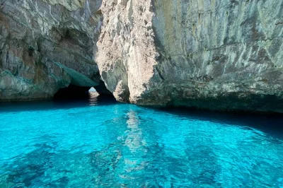 Feel the sea air on a capri private boat tour with stops at blue grotto, faraglioni rocks, and seaside restaurants. includes skipper, snorkeling gear, and towels.