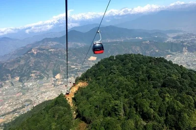 Feel the thrill of kathmandu’s chandragiri cable car, glide above jungle, explore bhaleshwor mahadev temple, and enjoy a hilltop lunch. includes pickup.