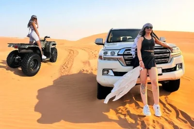 Feel the thrill of dubai’s desert with quad biking, dune bashing, camel rides, and a bedouin camp bbq. includes hotel pickup and local guide for a seamless evening.