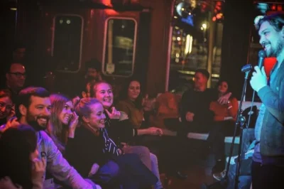 Step onto berlin’s floating lounge for a night of english stand-up, riverside views of the east side gallery, and a free shot—plus plenty of laughs with locals.