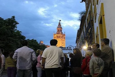Walk seville’s santa cruz at night with a local guide, hear legends and true stories, and explore hidden corners. includes spanish-speaking guide, taxes, and easy access.