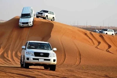 Feel the thrill of dubai’s desert with a private 4x4 safari, camel ride, sandboarding, and bbq dinner under the stars. includes hotel pickup and live shows.