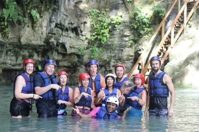 Feel the rush at damajagua’s waterfalls near puerto plata, hike jungle trails, jump and slide into cool pools, then share a dominican buffet with mountain views. includes pickup.