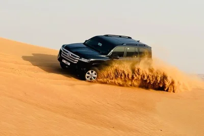 Feel the rush of dubai’s red dunes with dune bashing, camel rides, a bbq dinner, and live shows—includes hotel pickup and an expert local guide.