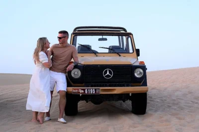 Vivez un safari privé matinal dans le désert de l’oasis al marmoom à dubaï. montez à bord d’une mercedes g-class vintage, visitez un village bédouin et profitez d’une balade à dos de cham