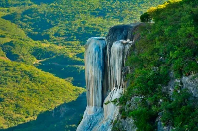 Feel the magic of oaxaca on a guided day trip to hierve el agua, mitla, teotitlán del valle and a mezcal tasting, with hotel pickup and local lunch included.