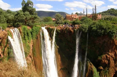 Experience morocco’s ouzoud falls on a guided day trip from marrakech. includes hotel pickup, boat ride, and a walk near the cascades. book your spot now.
