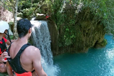 Feel the rush in cebu with a canyoneering day trip at kawasan falls, river jumps, swimming, and a homemade filipino lunch. includes pickup and all safety gear.